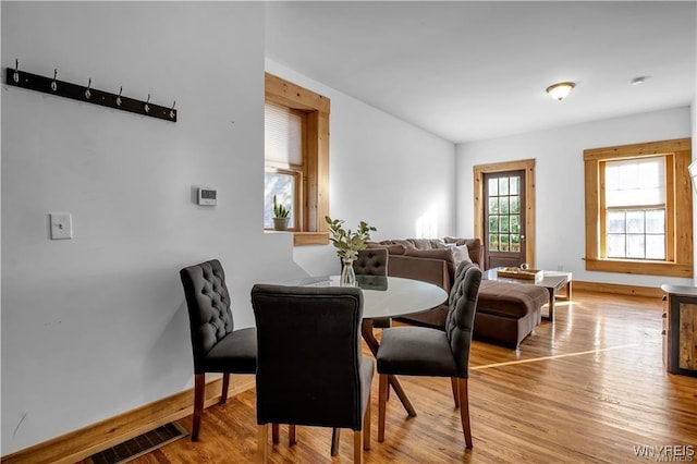 58 Park St, Buffalo, NY 14201 - dining room with light wood-style floors and baseboards