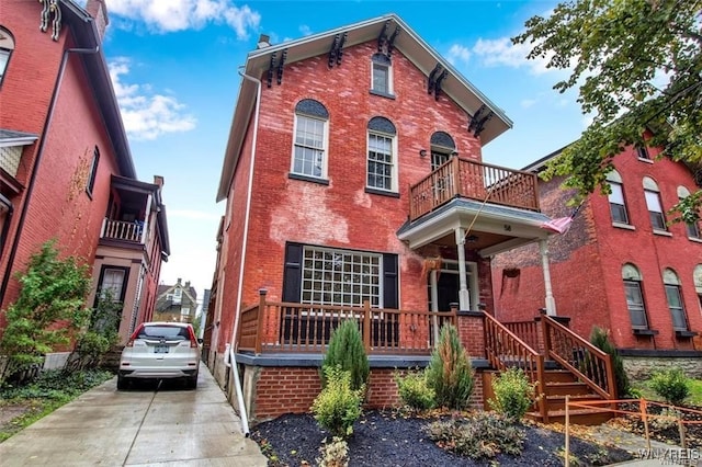 58 Park St, Buffalo, NY 14201 - italianate-style house with brick siding and a balcony
