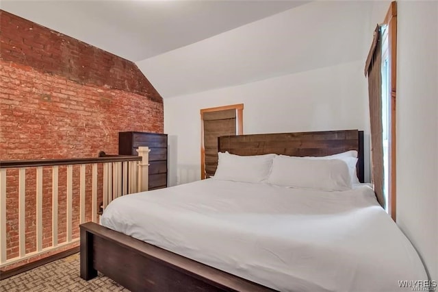 58 Park St, Buffalo, NY 14201 - bedroom featuring brick wall and lofted ceiling