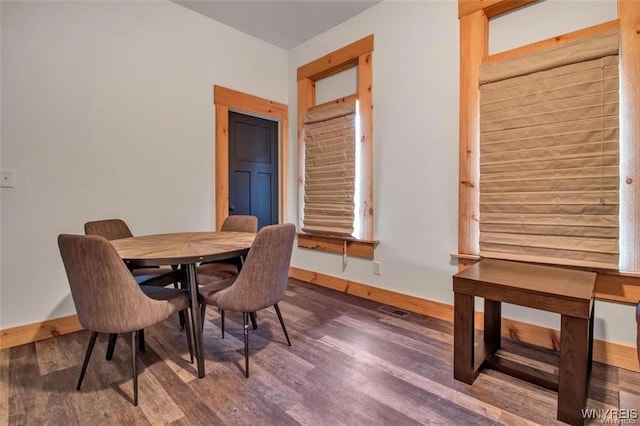58 Park St, Buffalo, NY 14201 - dining area with baseboards and wood finished floors