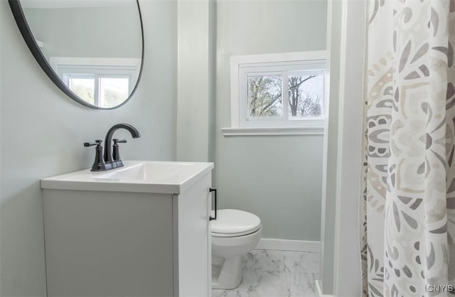 83 Salisbury St, Sandy Creek, NY 13083 - full bath with toilet, marble finish floor, vanity, a shower with shower curtain, and baseboards