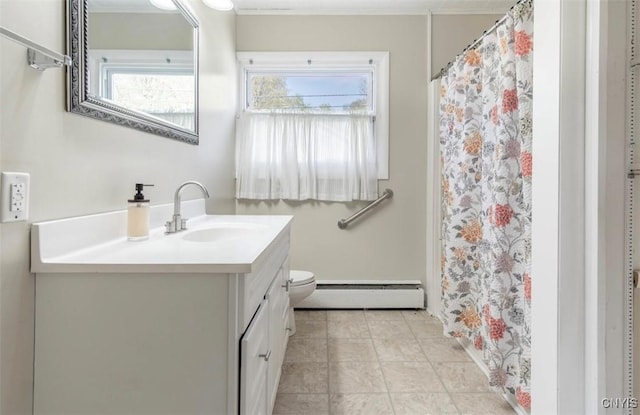 83 Salisbury St, Sandy Creek, NY 13083 - full bathroom featuring crown molding, toilet, vanity, and a baseboard heating unit