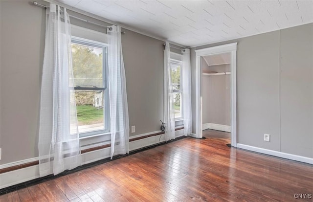 83 Salisbury St, Sandy Creek, NY 13083 - empty room featuring baseboards and hardwood / wood-style floors