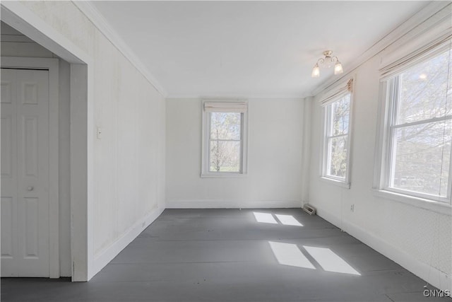 8733 State Route 289, Ellisburg, NY 13605 - unfurnished room with crown molding, plenty of natural light, and baseboards