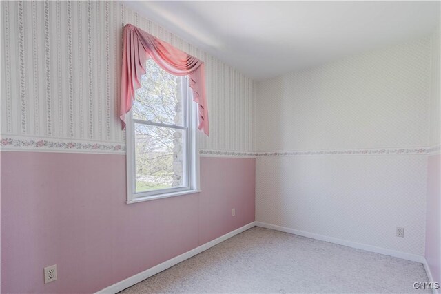 8733 State Route 289, Ellisburg, NY 13605 - carpeted spare room with wallpapered walls and a wealth of natural light