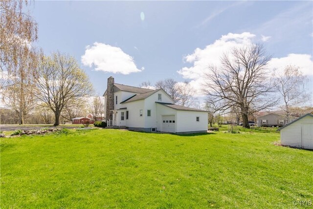 8733 State Route 289, Ellisburg, NY 13605 - view of property exterior with a chimney, a shed, a garage, and a lawn