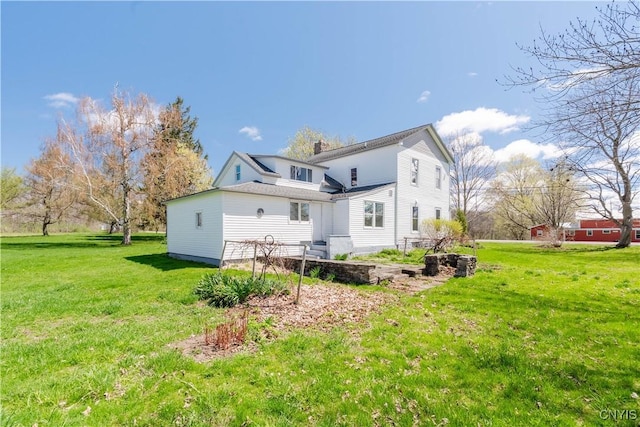 8733 State Route 289, Ellisburg, NY 13605 - rear view of property featuring a yard and a chimney