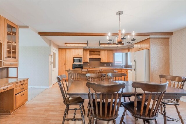 8733 State Route 289, Ellisburg, NY 13605 - dining room with wallpapered walls, light wood-style flooring, and a notable chandelier