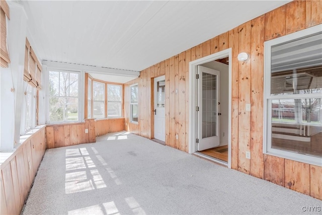 8733 State Route 289, Ellisburg, NY 13605 - empty room featuring carpet flooring and wood walls
