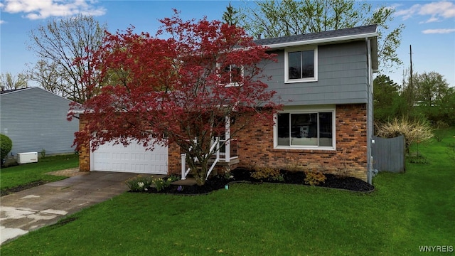 view of front of property featuring concrete driveway, an attached garage, brick siding, and a front yard