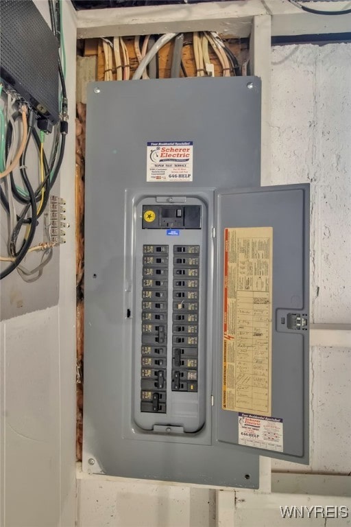 utility room featuring electric panel