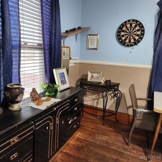 office area with wood finished floors and baseboards