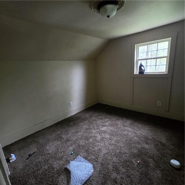 1570 Pennsylvania Ave, Southport, NY 14871 - bonus room featuring baseboards, lofted ceiling, and carpet floors