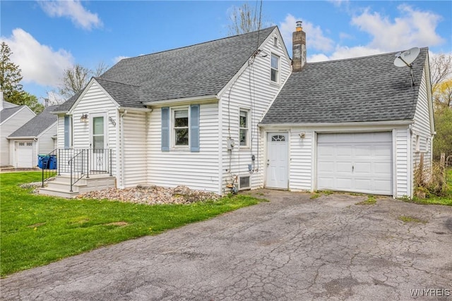 view of property exterior with a garage, a shingled roof, a chimney, and driveway