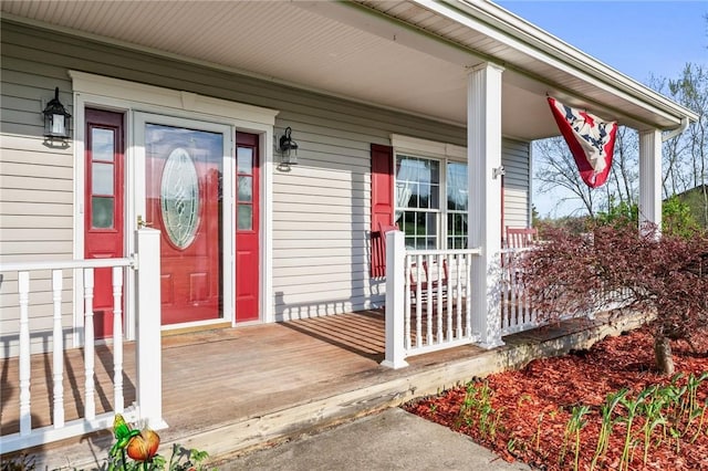 entrance to property featuring a porch