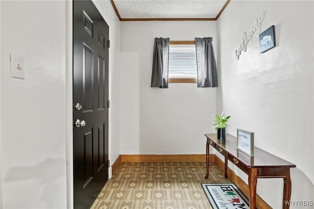 doorway to outside with carpet flooring, baseboards, and ornamental molding