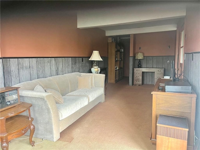 living room featuring light carpet and wainscoting
