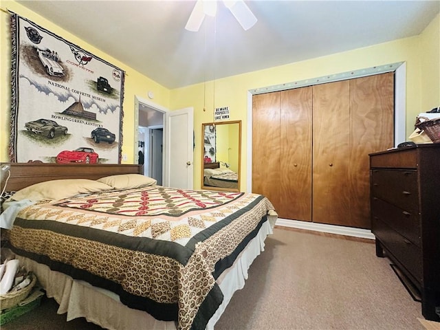 bedroom featuring carpet flooring, a closet, and a ceiling fan