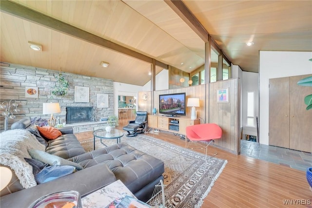 66 Stonecroft Ln, Amherst, NY 14226 - living room featuring wood finished floors, a fireplace, and wooden ceiling