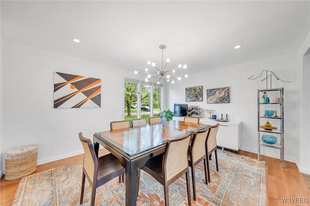 66 Stonecroft Ln, Amherst, NY 14226 - dining room with a chandelier, light wood finished floors, recessed lighting, and baseboards