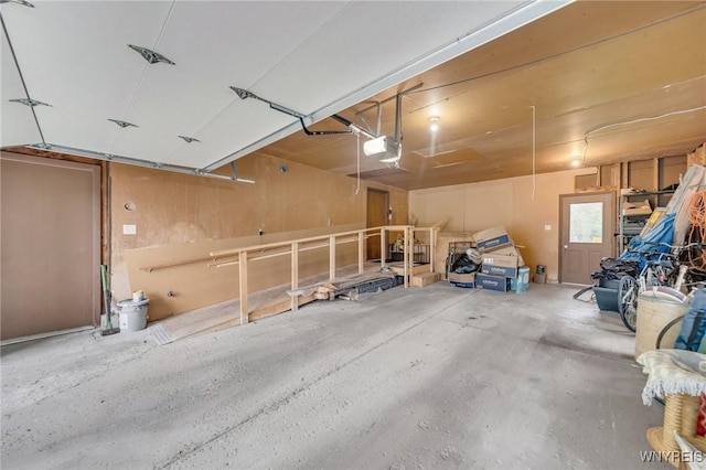 66 Stonecroft Ln, Amherst, NY 14226 - garage featuring a garage door opener