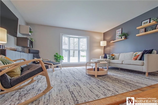 living room with wood finished floors
