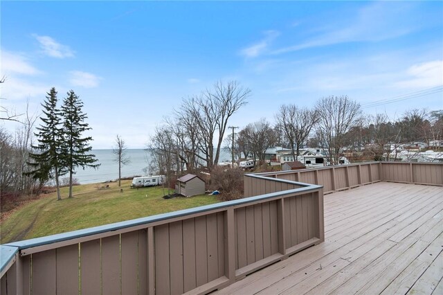 7893 Lake Rd, Sodus, NY 14555 - deck with a water view and a lawn
