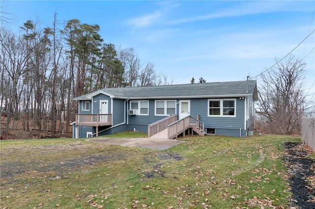 7893 Lake Rd, Sodus, NY 14555 - view of front facade featuring a front yard, a shingled roof, and fence