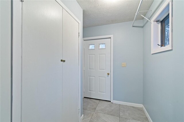 7893 Lake Rd, Sodus, NY 14555 - interior space featuring baseboards and a textured ceiling