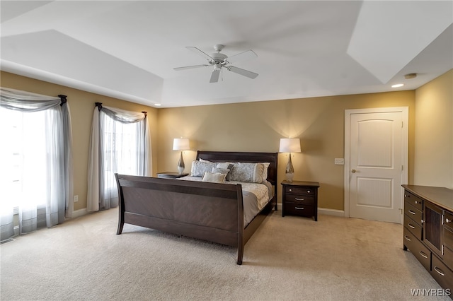 bedroom featuring light colored carpet, baseboards, ceiling fan, and recessed lighting