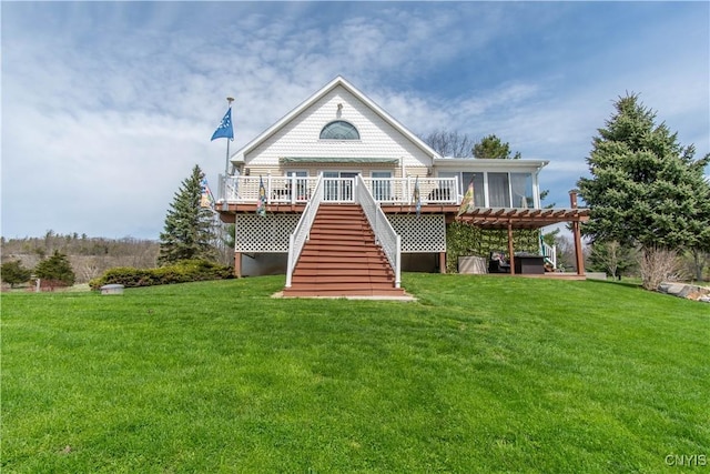 21770 Bullhead Bay Rd, Alexandria, NY 13640 - rear view of house with stairs, a deck, a lawn, and a sunroom