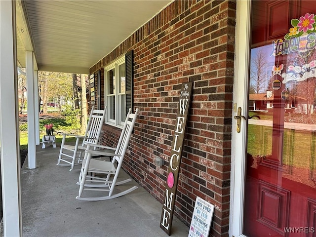 view of patio featuring a porch
