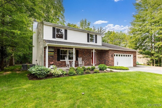 103 Old Orchard Ln, Orchard Park, NY 14127 - traditional-style home featuring a porch, a garage, driveway, a chimney, and a front lawn