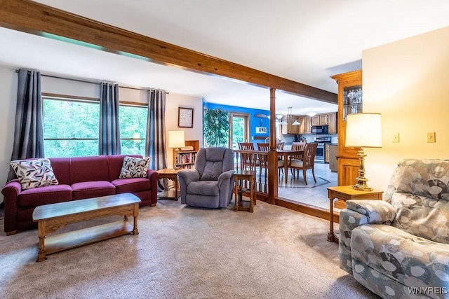 103 Old Orchard Ln, Orchard Park, NY 14127 - living area with beam ceiling and carpet flooring