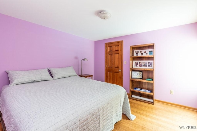 103 Old Orchard Ln, Orchard Park, NY 14127 - bedroom with light wood finished floors and baseboards