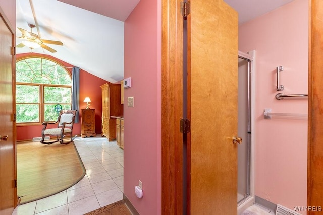 103 Old Orchard Ln, Orchard Park, NY 14127 - hallway with vaulted ceiling and light tile patterned floors
