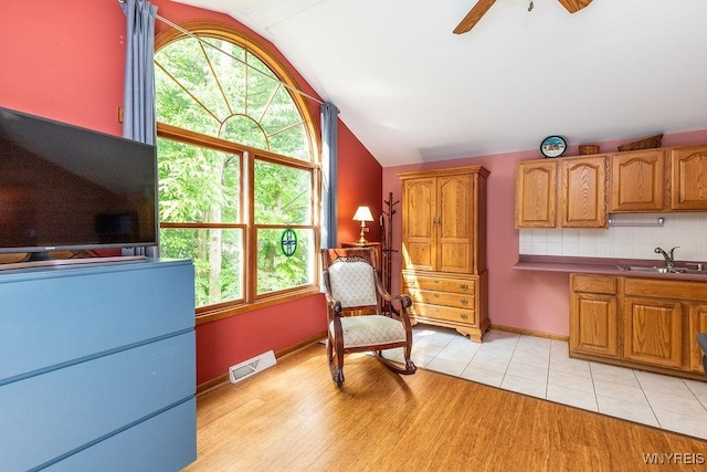 103 Old Orchard Ln, Orchard Park, NY 14127 - sitting room with lofted ceiling, ceiling fan, light wood-style flooring, and baseboards