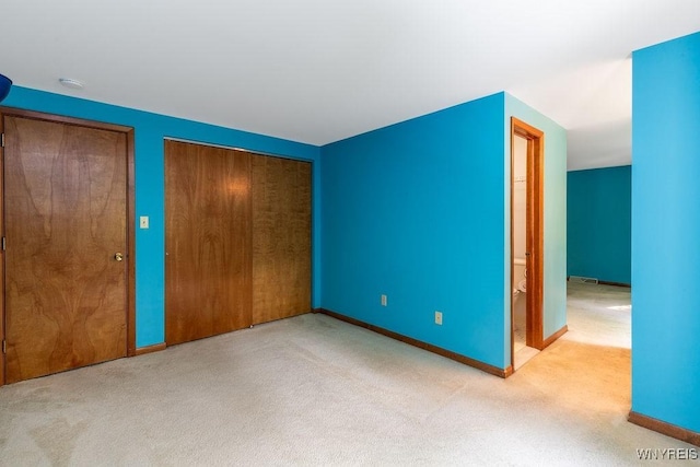 103 Old Orchard Ln, Orchard Park, NY 14127 - unfurnished bedroom featuring carpet, baseboards, and a closet