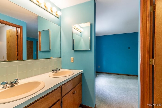 103 Old Orchard Ln, Orchard Park, NY 14127 - bathroom with double vanity and decorative backsplash