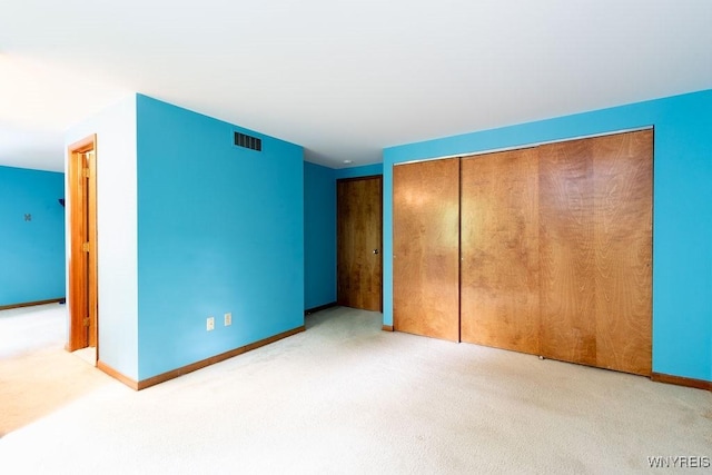 103 Old Orchard Ln, Orchard Park, NY 14127 - unfurnished bedroom with carpet, baseboards, and a closet
