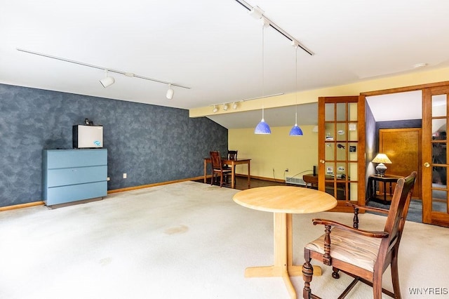 103 Old Orchard Ln, Orchard Park, NY 14127 - basement with rail lighting, carpet flooring, wallpapered walls, and baseboards