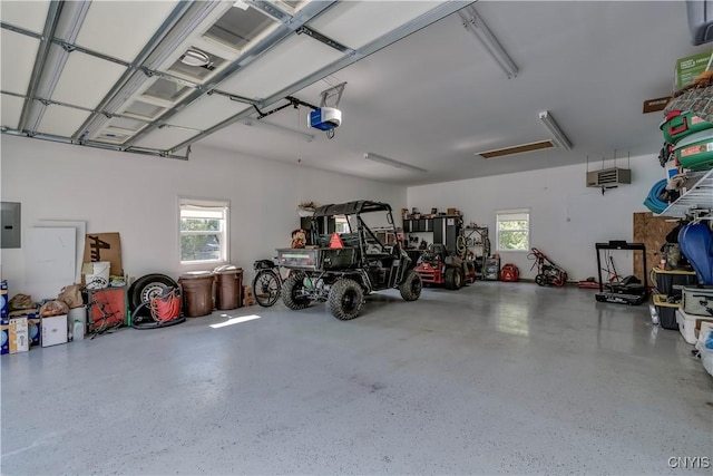 44458 County Route 100, Alexandria, NY 13640 - garage with electric panel and a garage door opener