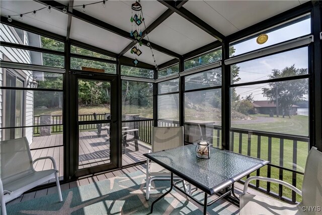 44458 County Route 100, Alexandria, NY 13640 - sunroom / solarium featuring a healthy amount of sunlight, expansive windows, and vaulted ceiling