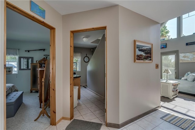 44458 County Route 100, Alexandria, NY 13640 - corridor featuring baseboards and light tile patterned flooring