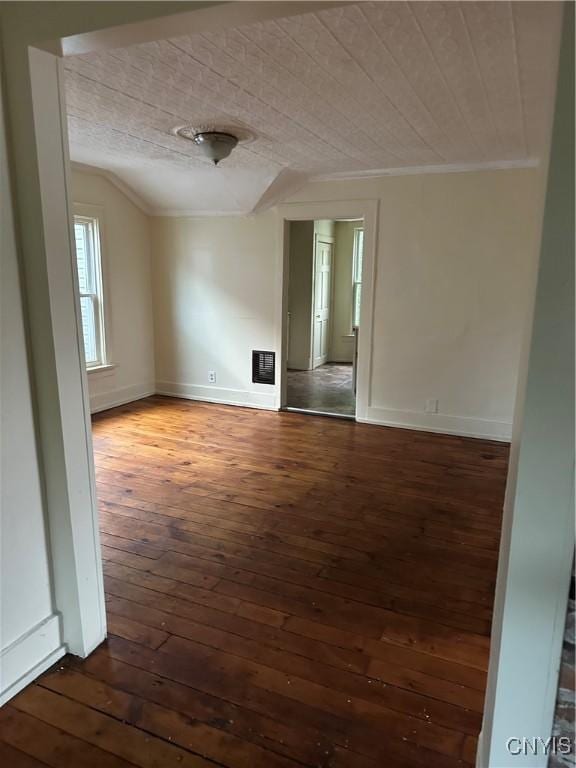 113 Grumbach Ave, Syracuse, NY 13203 - spare room featuring baseboards, ornamental molding, dark wood-style floors, and lofted ceiling