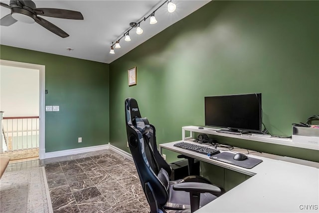 home office with track lighting, baseboards, and a ceiling fan