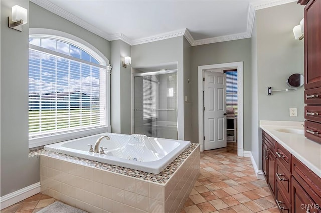 full bath with vanity, ornamental molding, a stall shower, a whirlpool tub, and baseboards