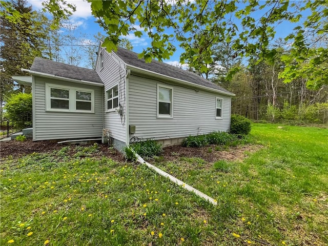 131 W Sullivanville Rd, Veteran, NY 14845 - view of property exterior featuring a yard and a shingled roof