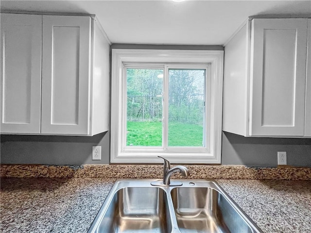 131 W Sullivanville Rd, Veteran, NY 14845 - kitchen featuring a sink, white cabinets, and dark countertops