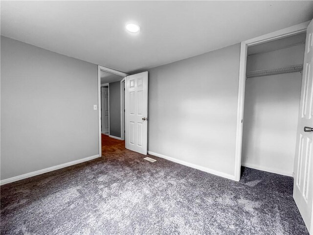 131 W Sullivanville Rd, Veteran, NY 14845 - unfurnished bedroom with carpet, baseboards, recessed lighting, and a closet